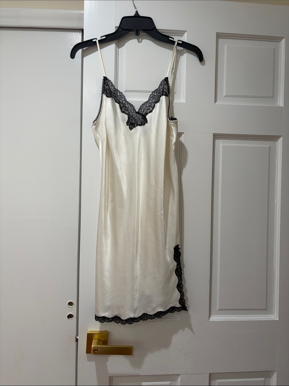 Silk-Feel Ivory Slip Dress with Black Lace Trim. Victoria’s Secret.